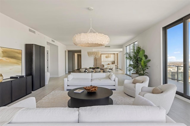 living room featuring a chandelier