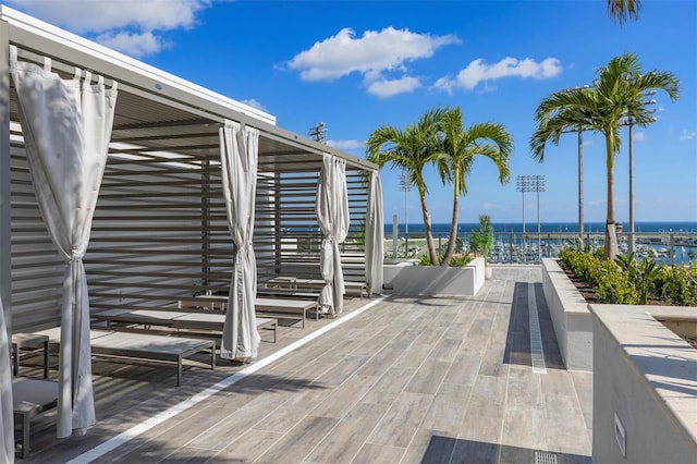 deck featuring a water view