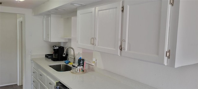 kitchen with sink and white cabinets