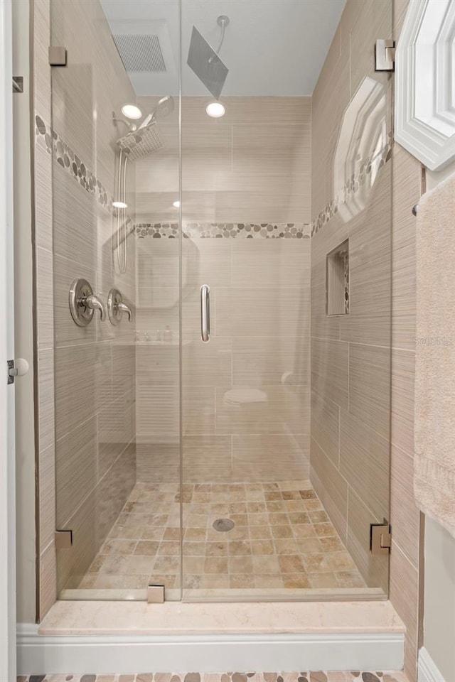 bathroom with walk in shower