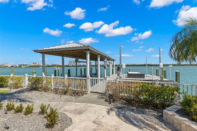 view of dock with a water view