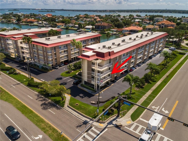 birds eye view of property featuring a water view