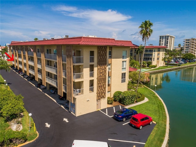 view of building exterior with a water view