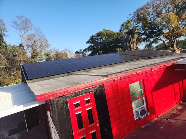 exterior space featuring solar panels