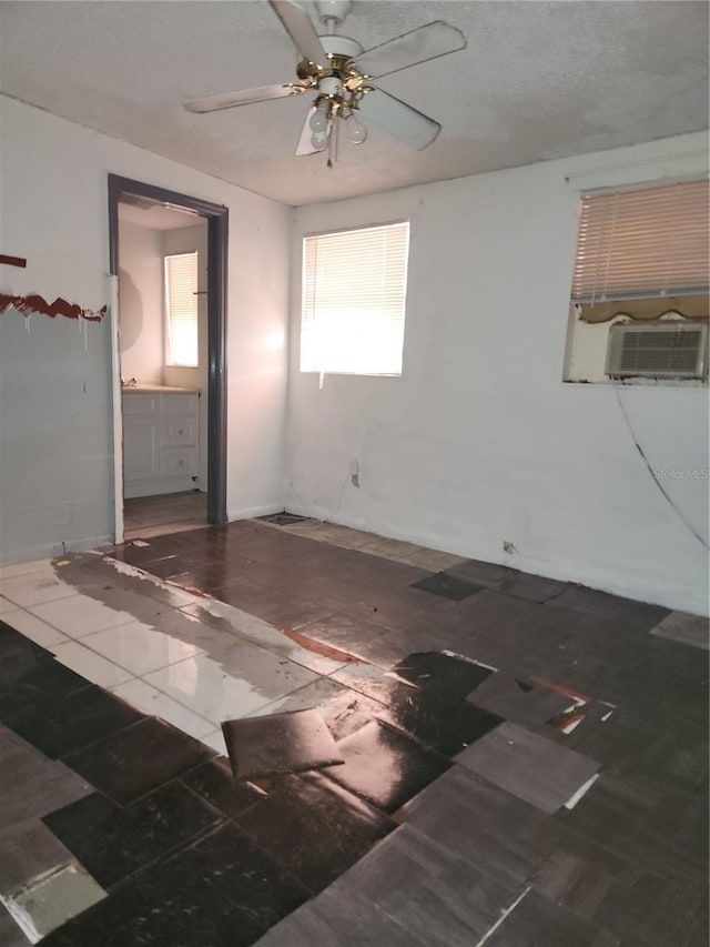 unfurnished room featuring ceiling fan