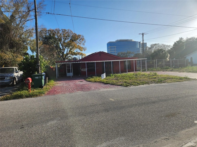 view of front of house featuring a carport