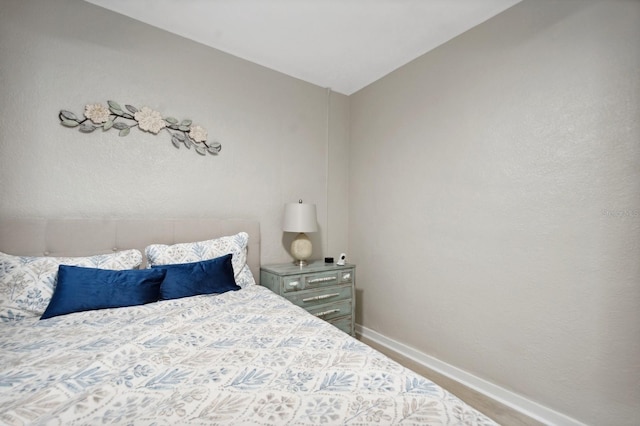 bedroom featuring vaulted ceiling