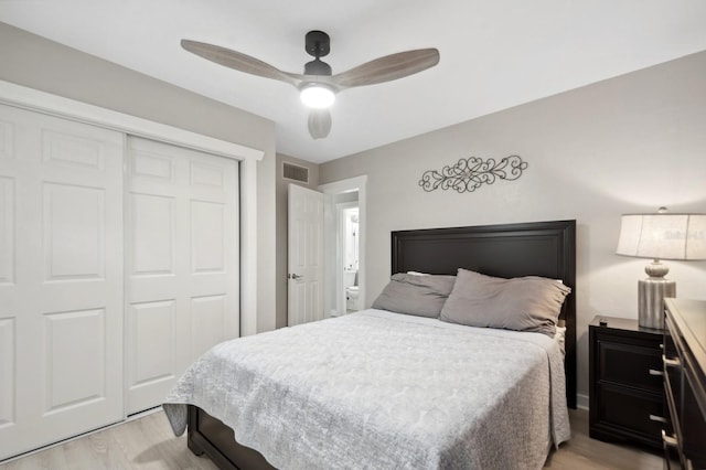 bedroom featuring a closet, ceiling fan, and light hardwood / wood-style flooring