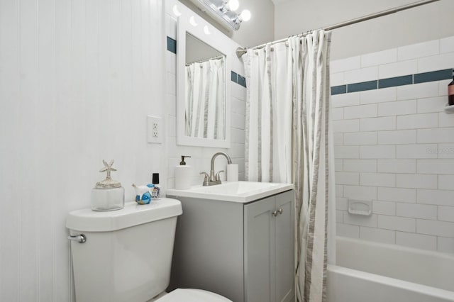 full bathroom featuring vanity, toilet, and shower / tub combo with curtain