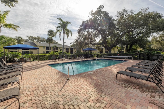 view of swimming pool with a patio area