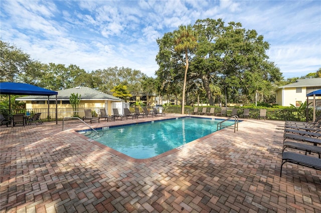 view of swimming pool featuring a patio