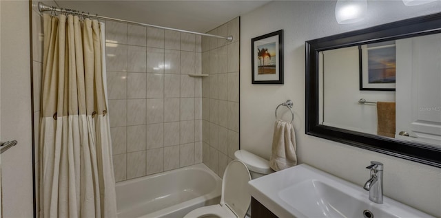 full bathroom featuring shower / bath combination with curtain, toilet, and vanity