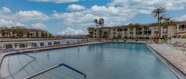 view of swimming pool with a patio