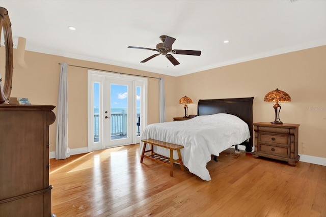 bedroom featuring access to exterior, light hardwood / wood-style floors, ceiling fan, and crown molding