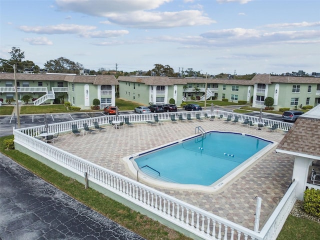 view of pool featuring a patio