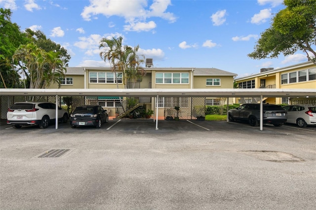 exterior space with a carport