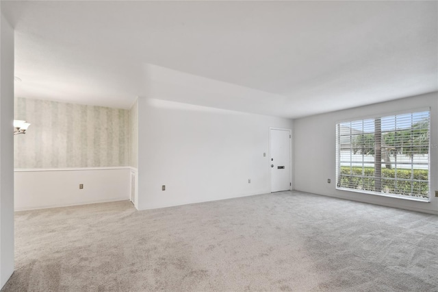 empty room featuring carpet flooring