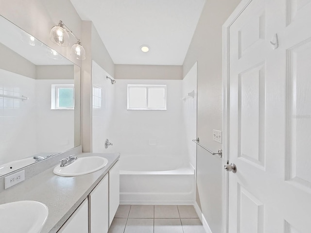 bathroom featuring dual bowl vanity, tile floors, and shower / bath combination