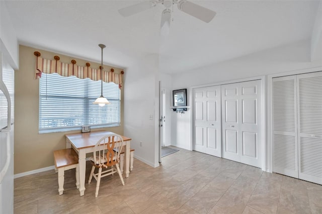 dining space featuring ceiling fan