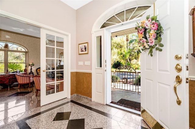 entryway featuring french doors