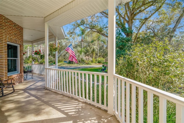 balcony featuring a porch