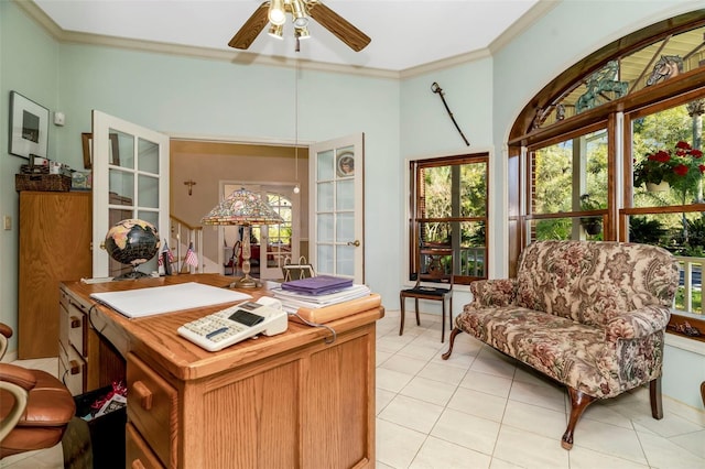 home office with ceiling fan, light tile patterned flooring, and ornamental molding