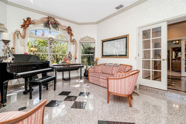 living area featuring crown molding and french doors