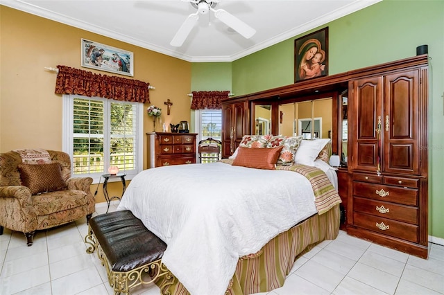 tiled bedroom with ceiling fan and ornamental molding