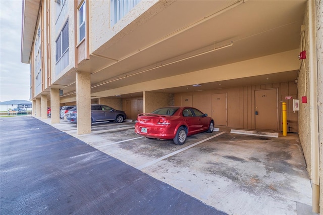 view of car parking featuring a carport