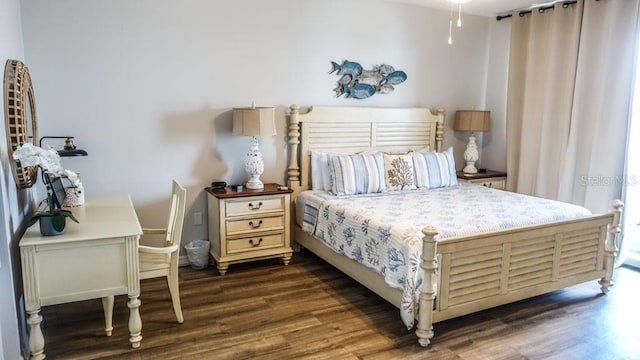 bedroom featuring dark hardwood / wood-style floors