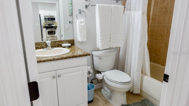 full bathroom with tile floors, toilet, vanity, and shower / tub combo with curtain