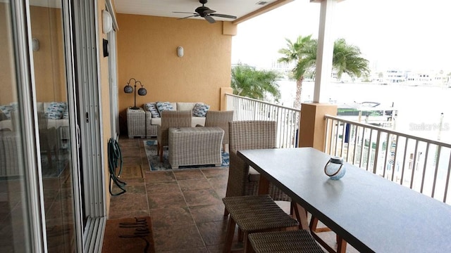 balcony featuring ceiling fan