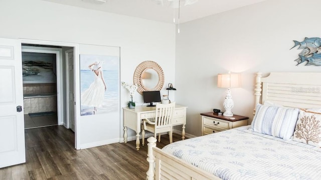 bedroom featuring dark hardwood / wood-style flooring