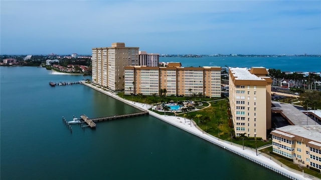 bird's eye view featuring a water view and a view of city