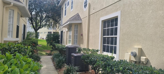 view of home's exterior featuring central AC unit