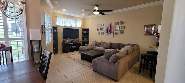 tiled living room featuring ornamental molding and ceiling fan