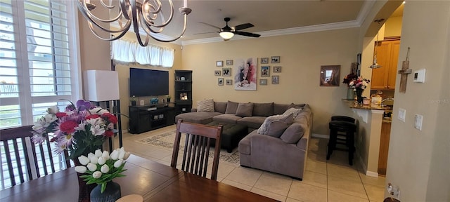 living room with crown molding, ceiling fan with notable chandelier, and light tile floors