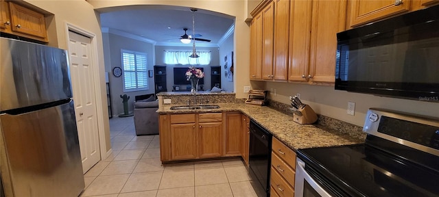 kitchen featuring ceiling fan, stone counters, ornamental molding, black appliances, and sink