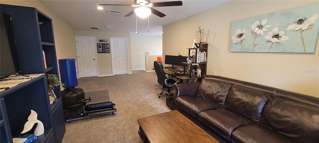 living room featuring light colored carpet and ceiling fan