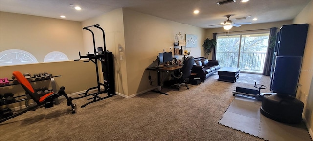 workout room with light carpet and ceiling fan