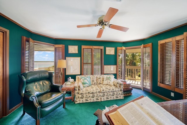 living room with dark carpet and ceiling fan