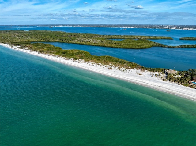 bird's eye view with a beach view and a water view