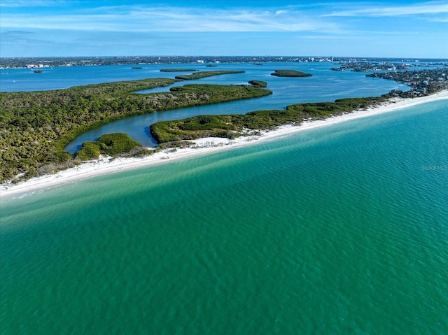 aerial view with a view of the beach and a water view