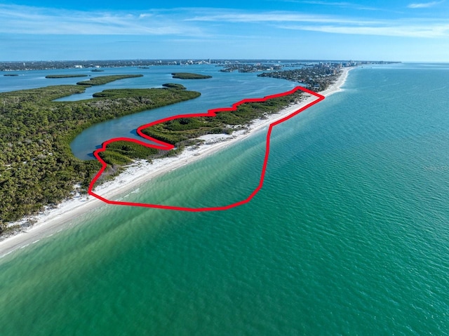 aerial view featuring a beach view and a water view