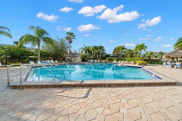 view of pool featuring a patio area