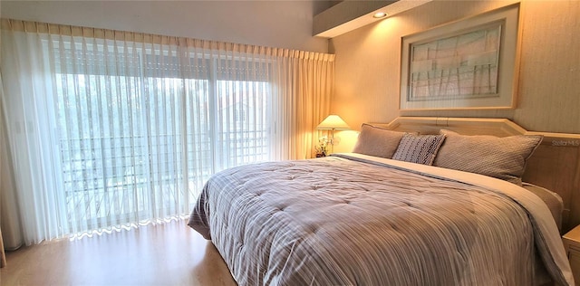 bedroom featuring hardwood / wood-style flooring