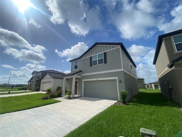 view of front of house with a front lawn and a garage