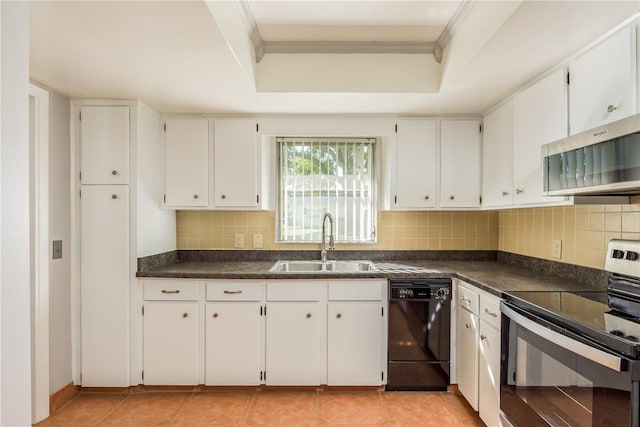 kitchen featuring stainless steel appliances, sink, tasteful backsplash, a raised ceiling, and white cabinetry