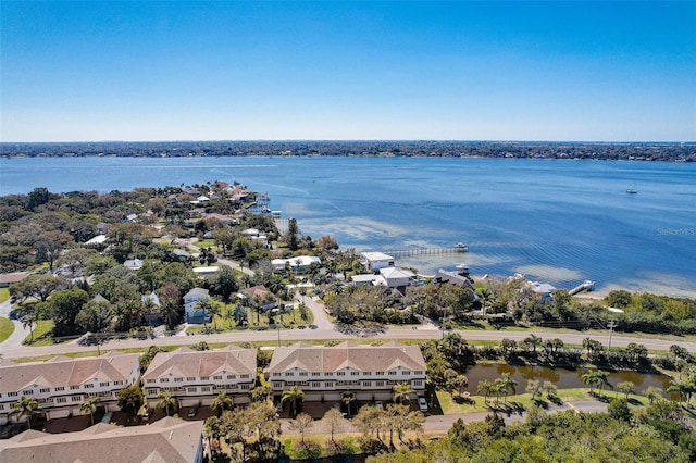 birds eye view of property featuring a residential view and a water view