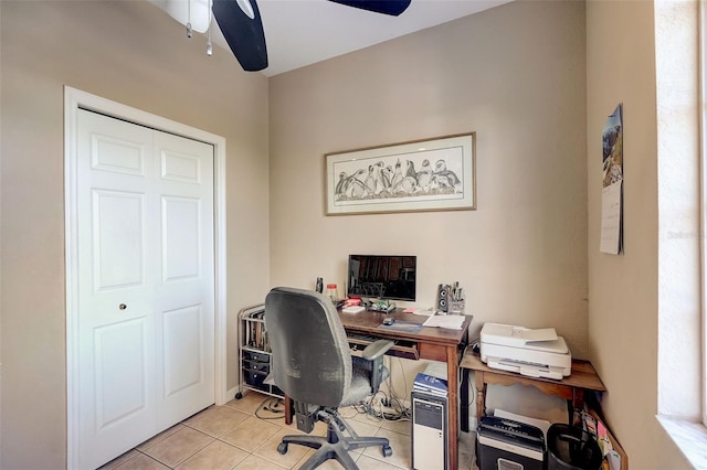 tiled home office with ceiling fan